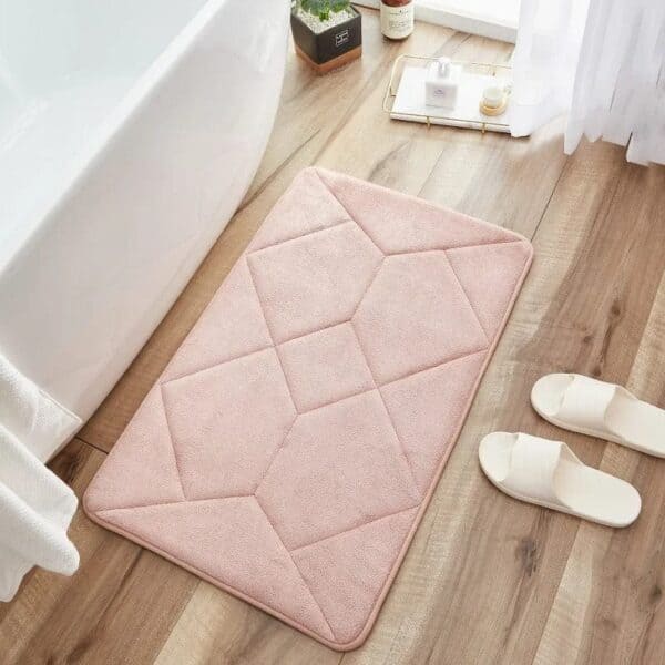 Antislip badmat van spons in roze, geschikt voor badkamer.