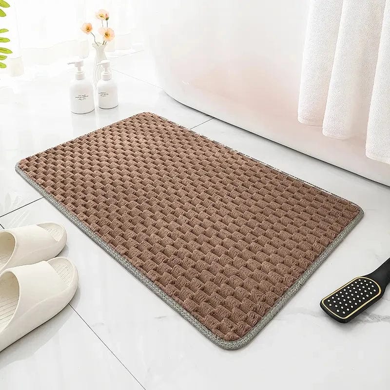 Antislip grootformaat badmat bruin met textuur voor badkamer.