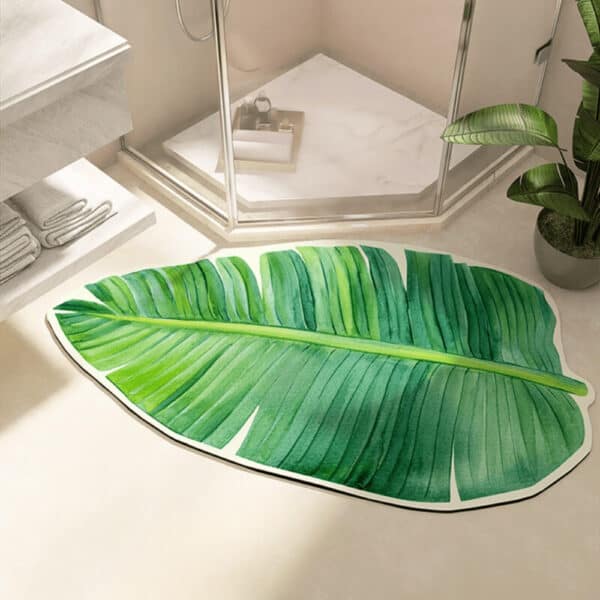 Bladvormig badkamer tapijt met groene bananenblad print.