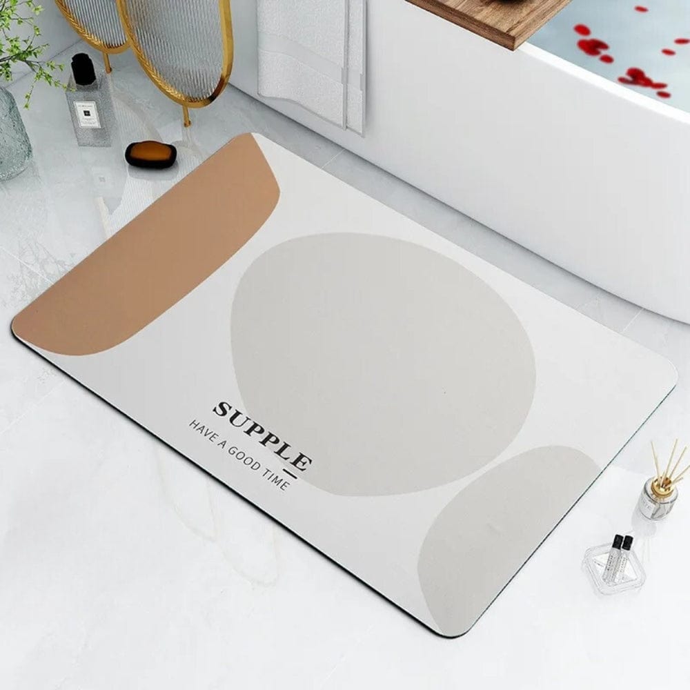 Moderne badkamermat met geometrische patronen en tekst 'Supple'.
