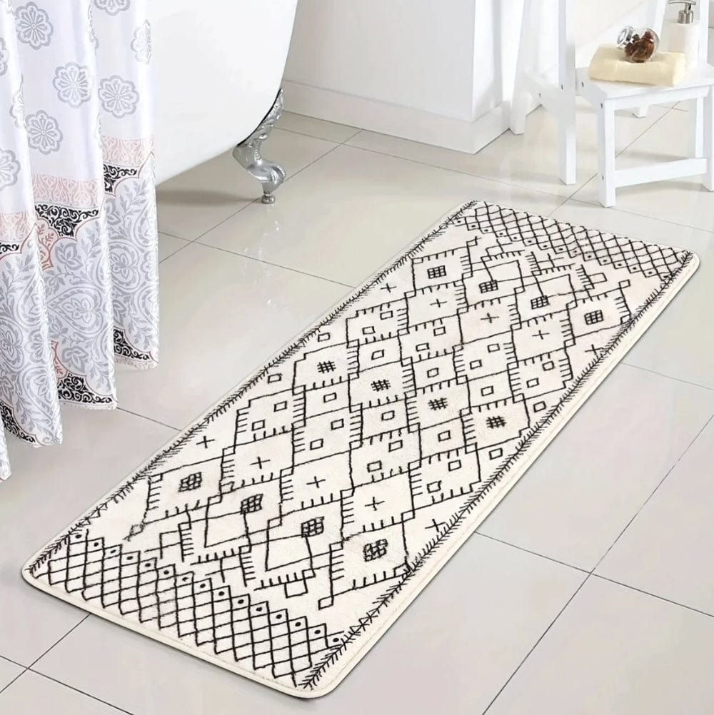 Extra grote badmat XXL met geometrisch zwart-wit patroon voor badkamer.
