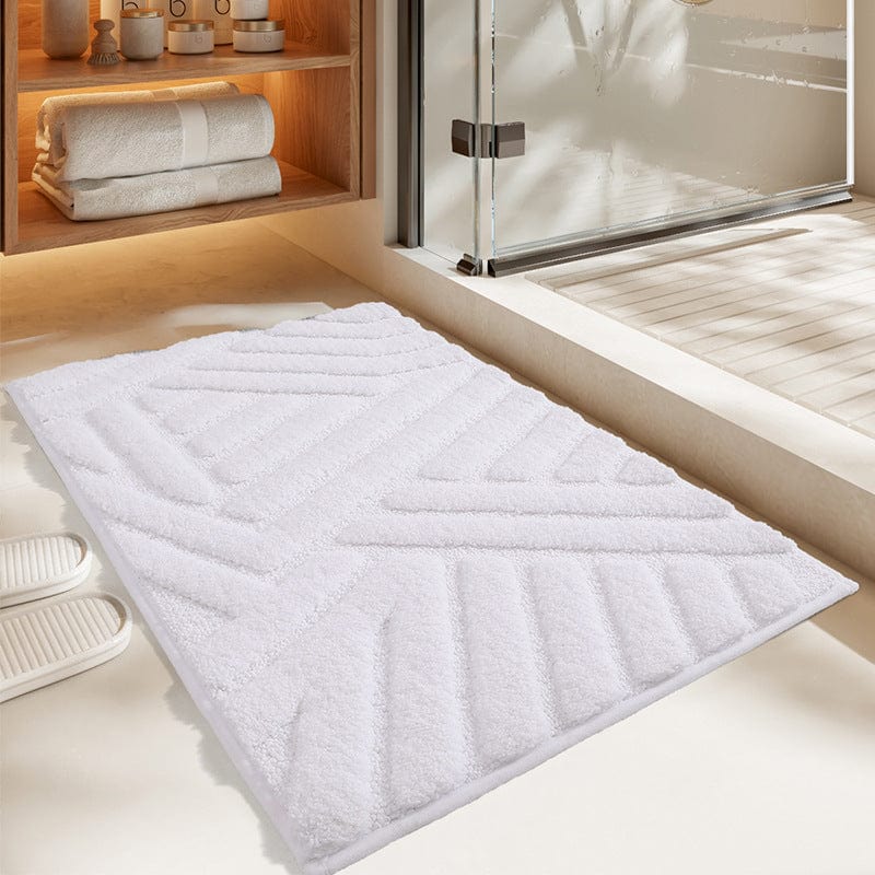 Grote witte badmat met geometrisch patroon voor badkamer.