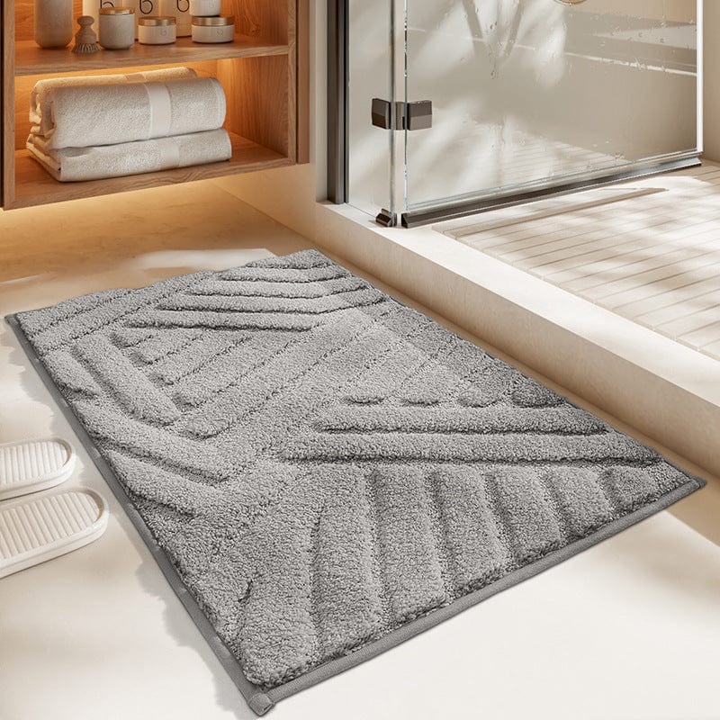 Grote badmat met geometrisch patroon voor badkamer.