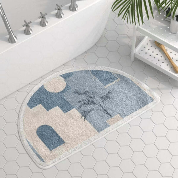 Halve maan badmat blauw met geometrisch ontwerp en palmblad.