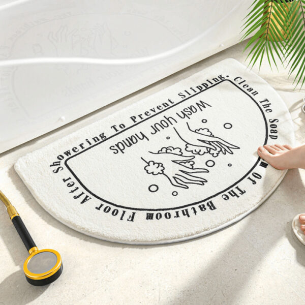 Halve maan douchetapijt met washanden en tekst voor badkamer.