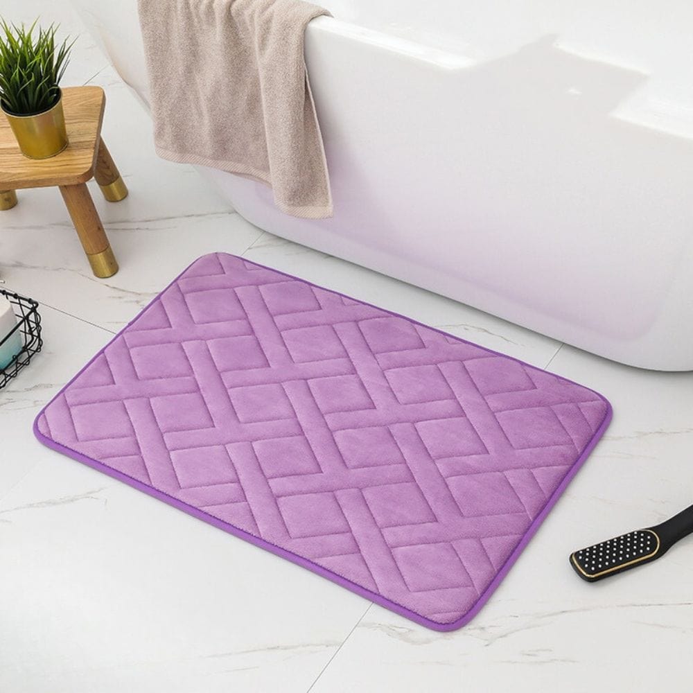 Luxe dikke paarse badmat met quilting, voor badkamer comfort.