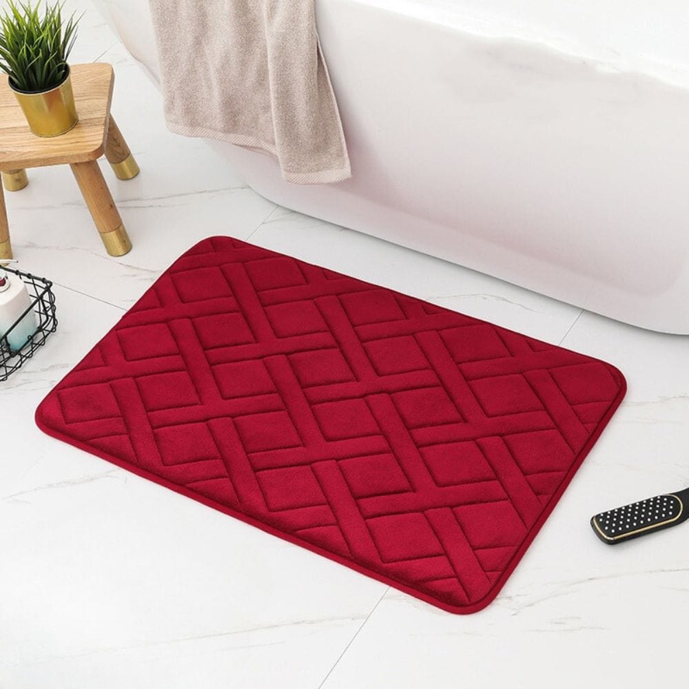 Rode luxe dikke badmat met quilting, voor badkamer comfort.