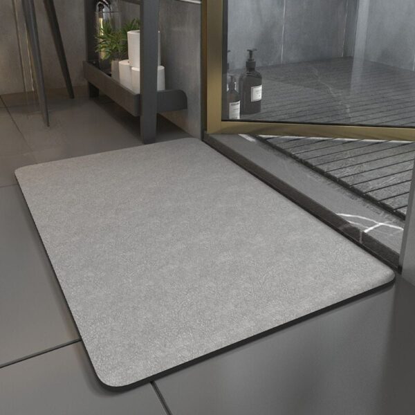 Magische absorberende badmat voor badkamer met stijlvolle grijze kleur.