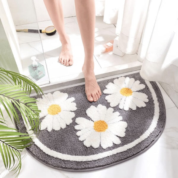 Halfronde badmat met daisymotief voor badkamer.