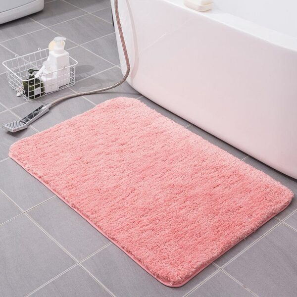 Roze antislip badmat voor bad, comfortabel en veilig.