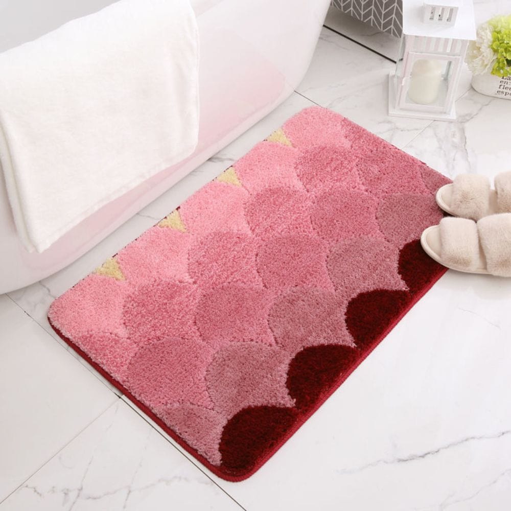 Roze design badmat met schubbenpatroon voor badkamer.