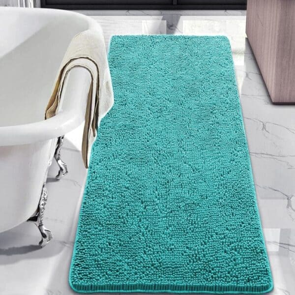 Turquoise chenille badmat met anti-slip textuur voor luxe badkamer.