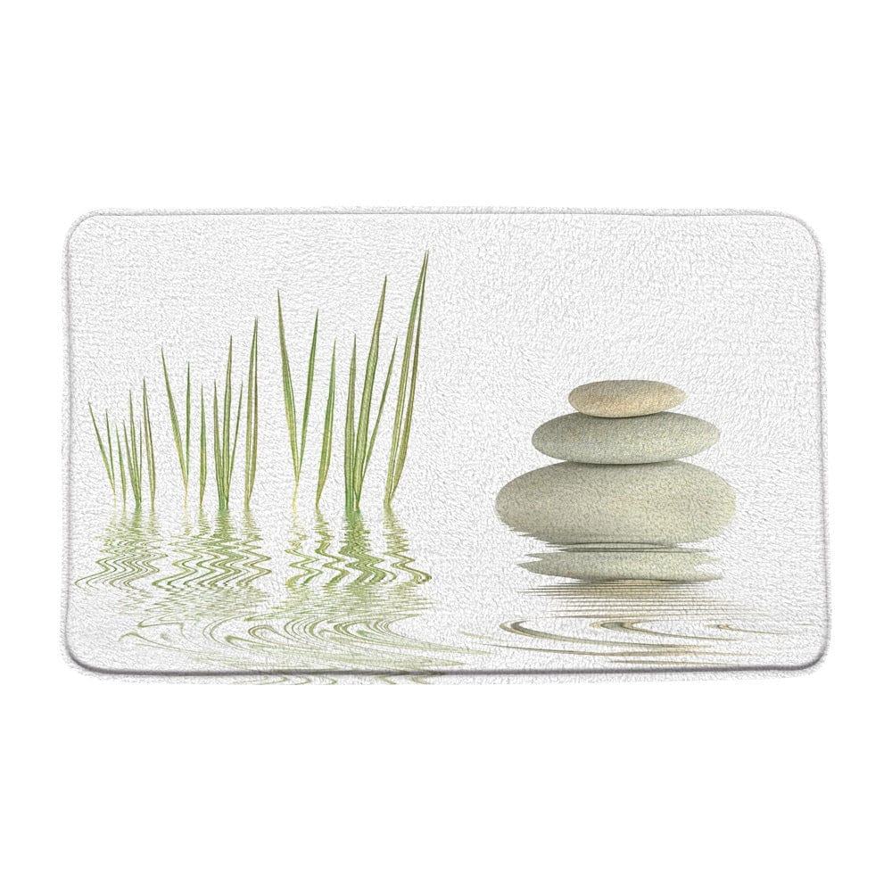Zen badkamer tapijt met stenen en riet voor ontspanning.