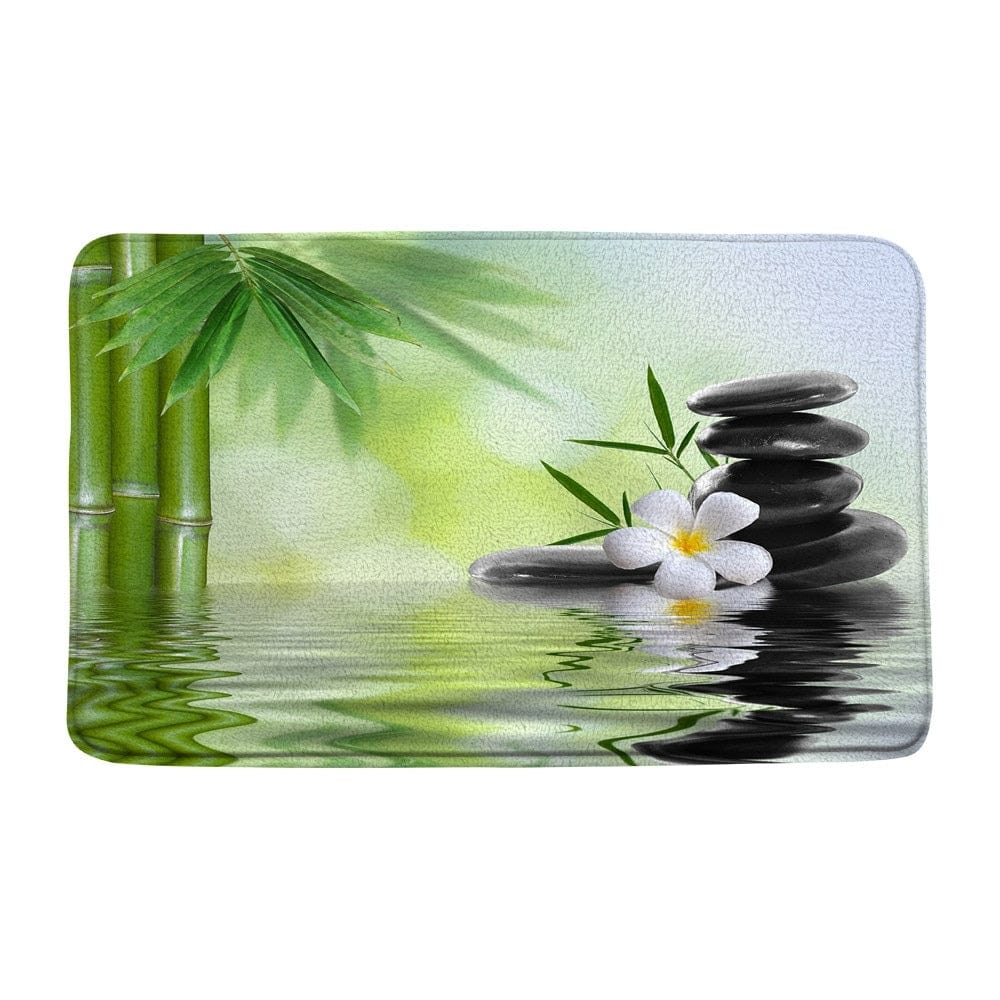 Zen badmat met bamboe, water en stenen voor ontspanning.