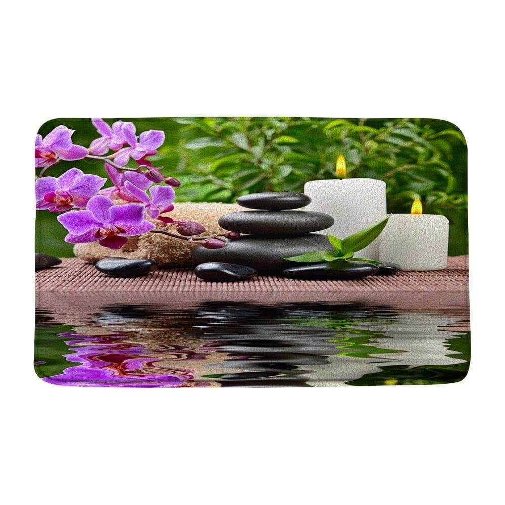Zen badkamer tapijt met orchideeën, stenen en kaarsen voor ontspanning.