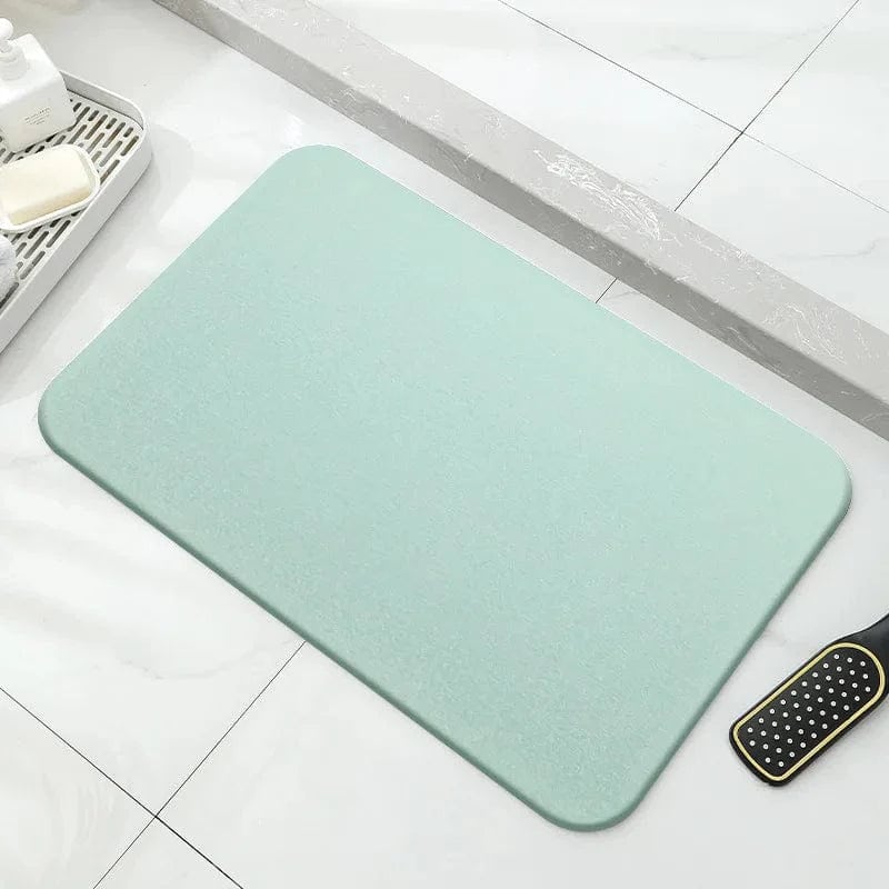 Groene badkamerstenenmat voor comfort en stijl.