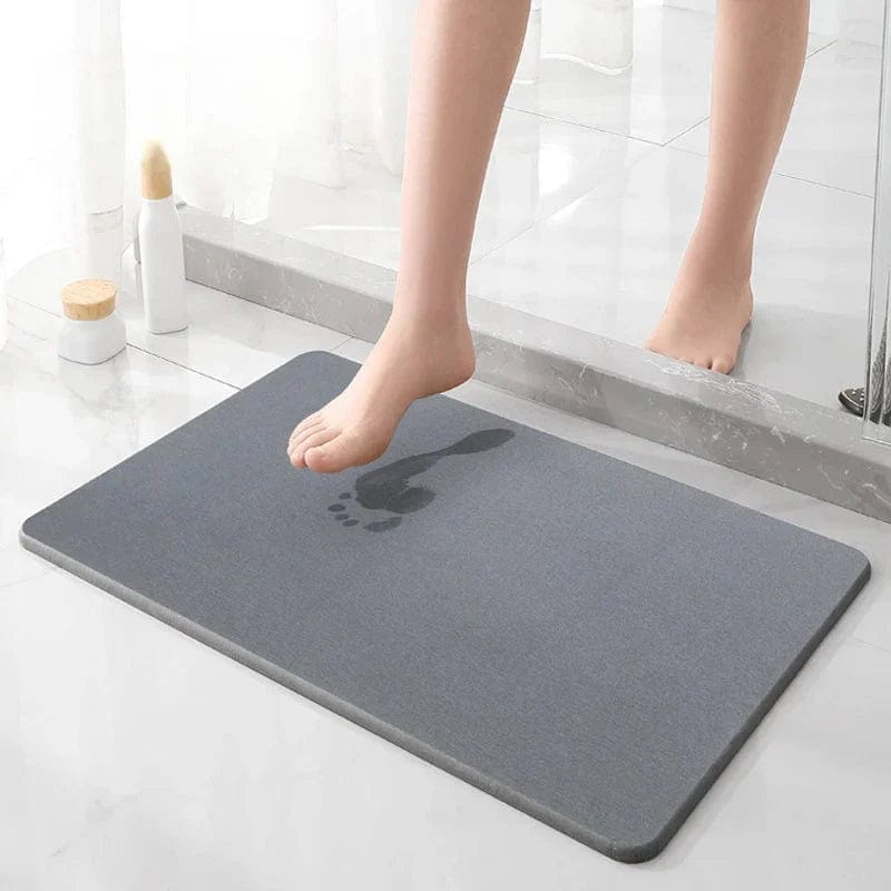 Grijze badkamerstenenmat met voetafdruk, anti-slip, comfortabel voor badkamer.