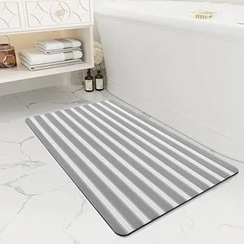 Antislip badmat met grijze strepen voor badkamer.