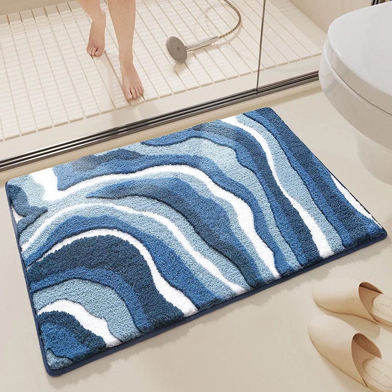 Blauwe golfpatroon badmat voor badkamer, comfortabel en stijlvol.