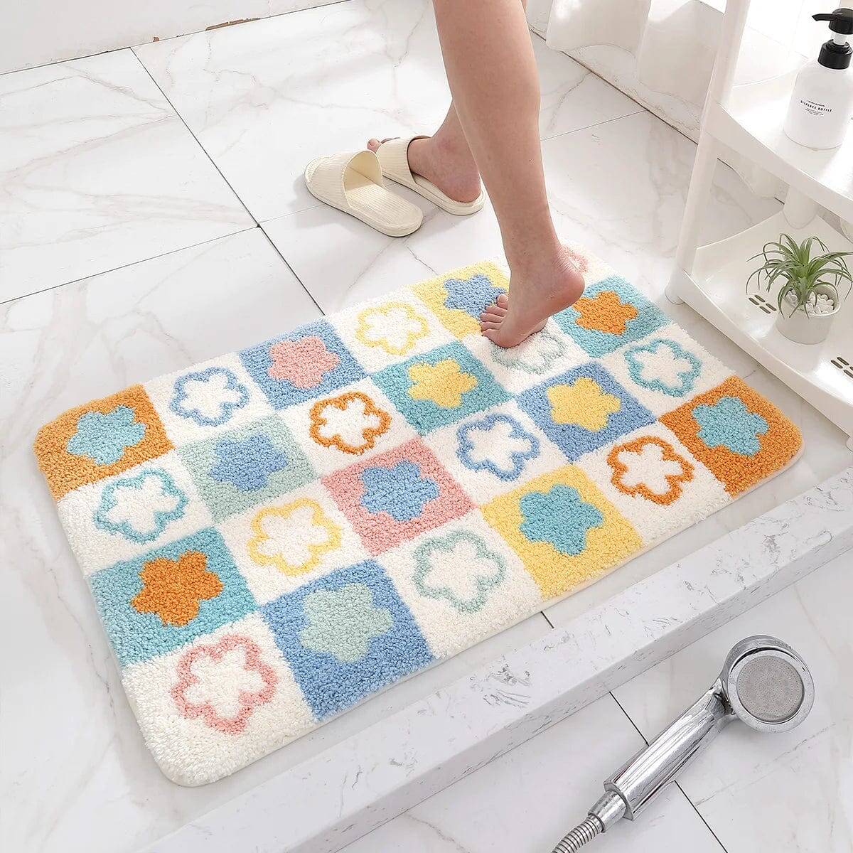 Luxe bloemen badmat in pastelkleuren voor badkamer.