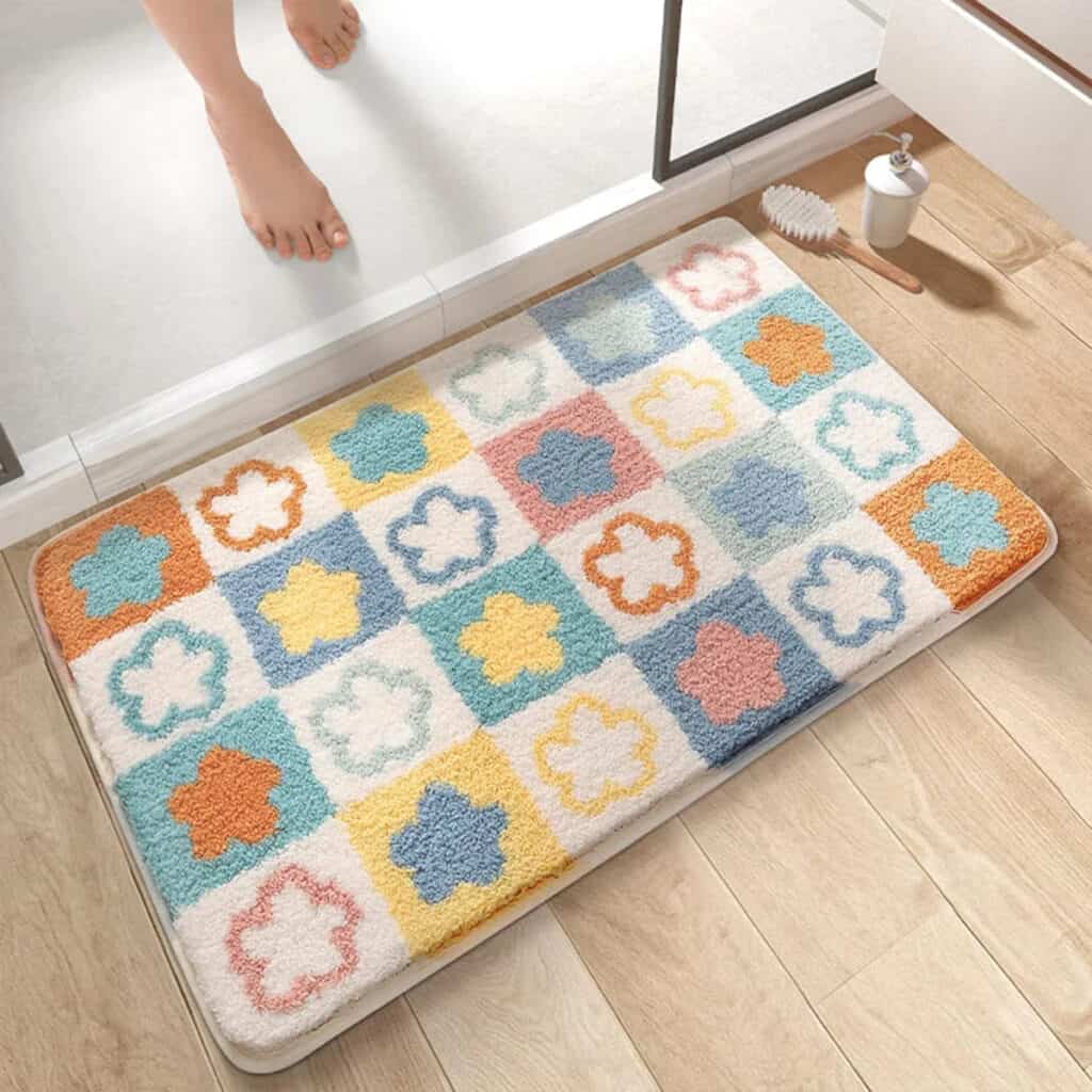 Kleurrijke bloemen badmat voor luxe badkamer decoratie.