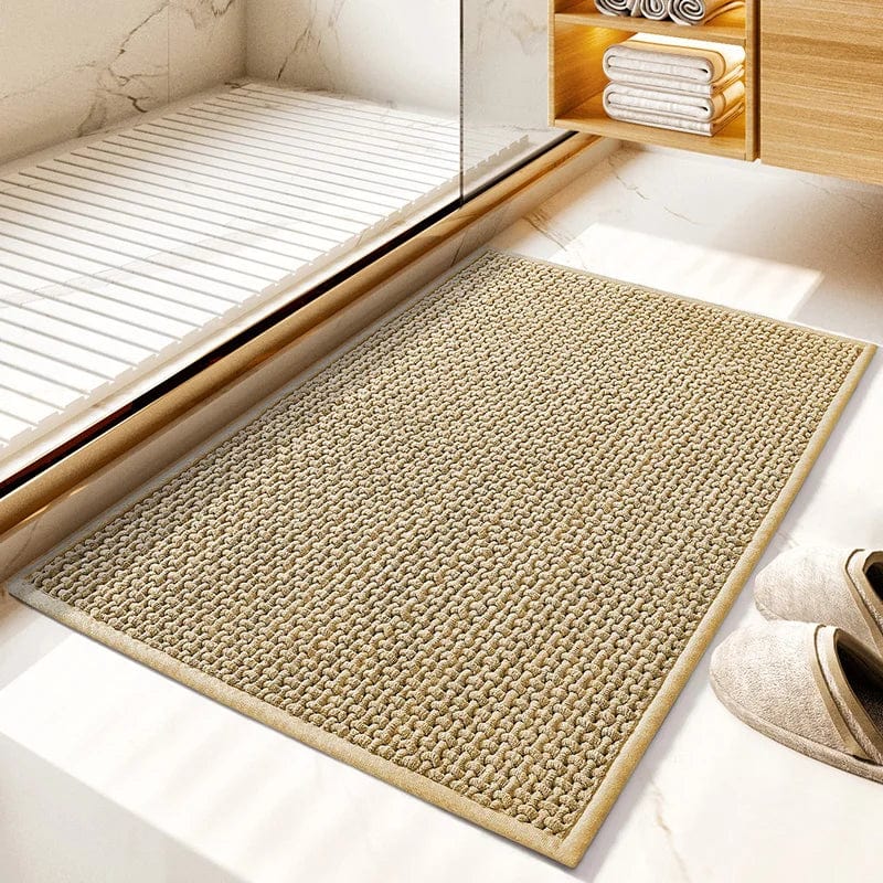 Gevlochten badmat in badkamer met natuurlijke kleur en textuur.