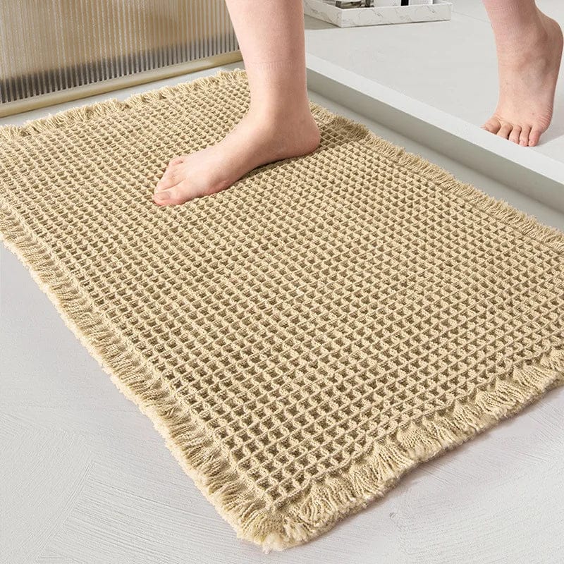 Geweven badkamertapijt met franje, natuurlijk beige, voor comfort en stijl.