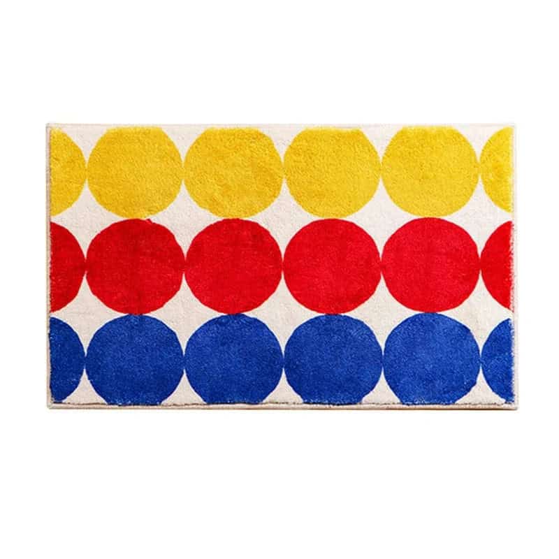 Rechthoekige badmat met kleurronde design, geel, rood en blauw.