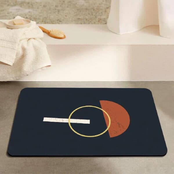 Diatomee badmat met geometrisch ontwerp in donkerblauw en oranje.