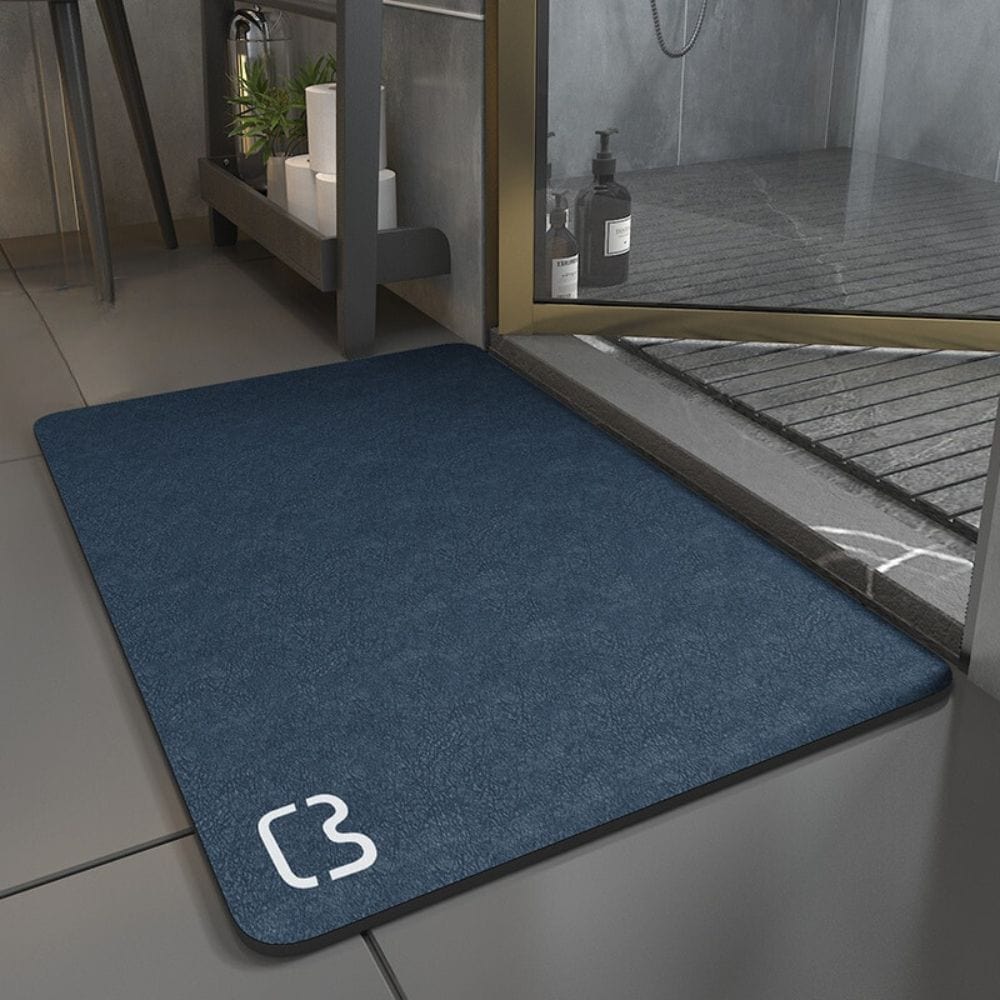 90cm blue bath mat with logo, non-slip, modern bathroom design.