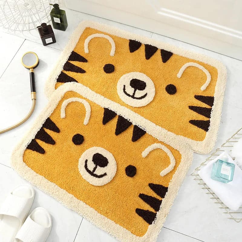 Cute tiger-themed bath mat for kids bathroom.