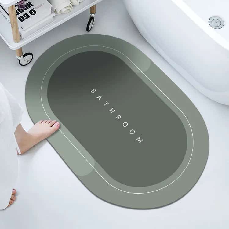 Anti slip bathroom mat with 'BATHROOM' text design.