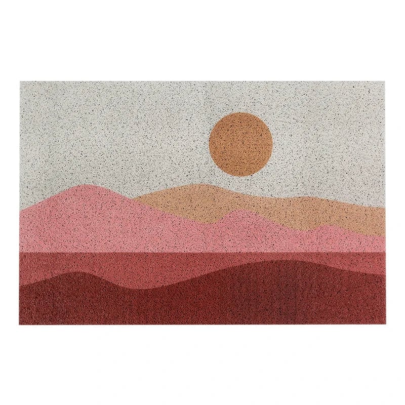 Art Deco bath mat with sunset mountain design in terracotta and pink tones.