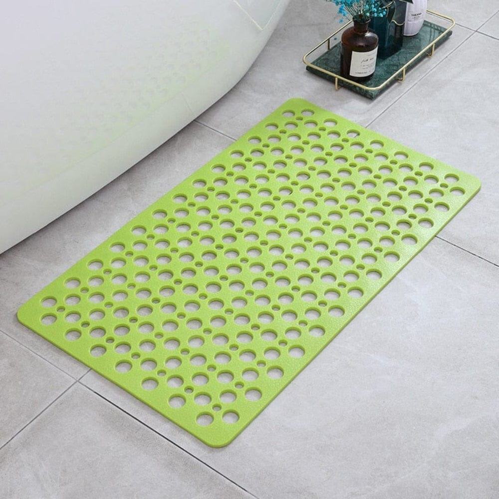 Green bath massage mat with drainage holes for comfort and safety.