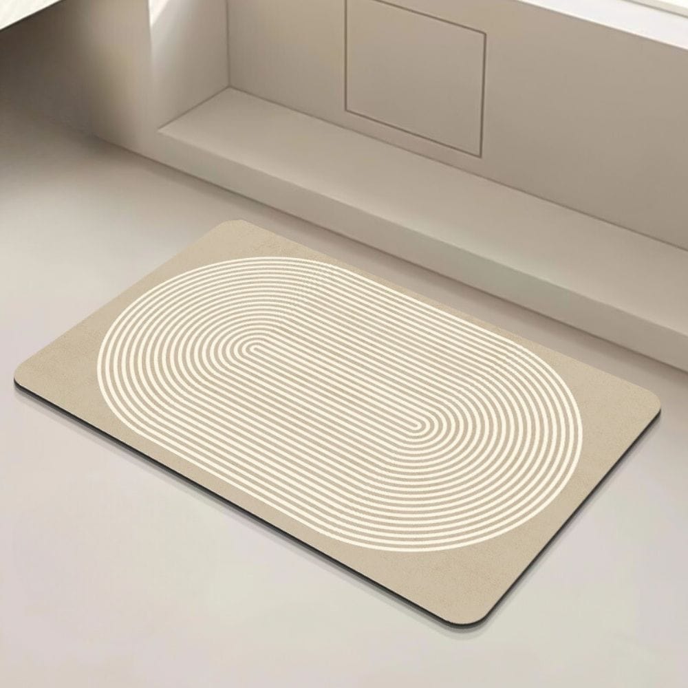 Modern oval bath mat with concentric stripe pattern for bathroom.