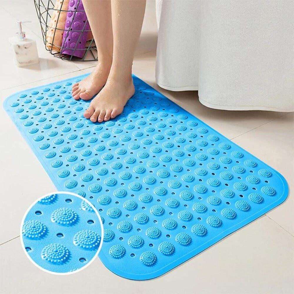 Blue textured bath mat with non-slip dots for bathroom safety.