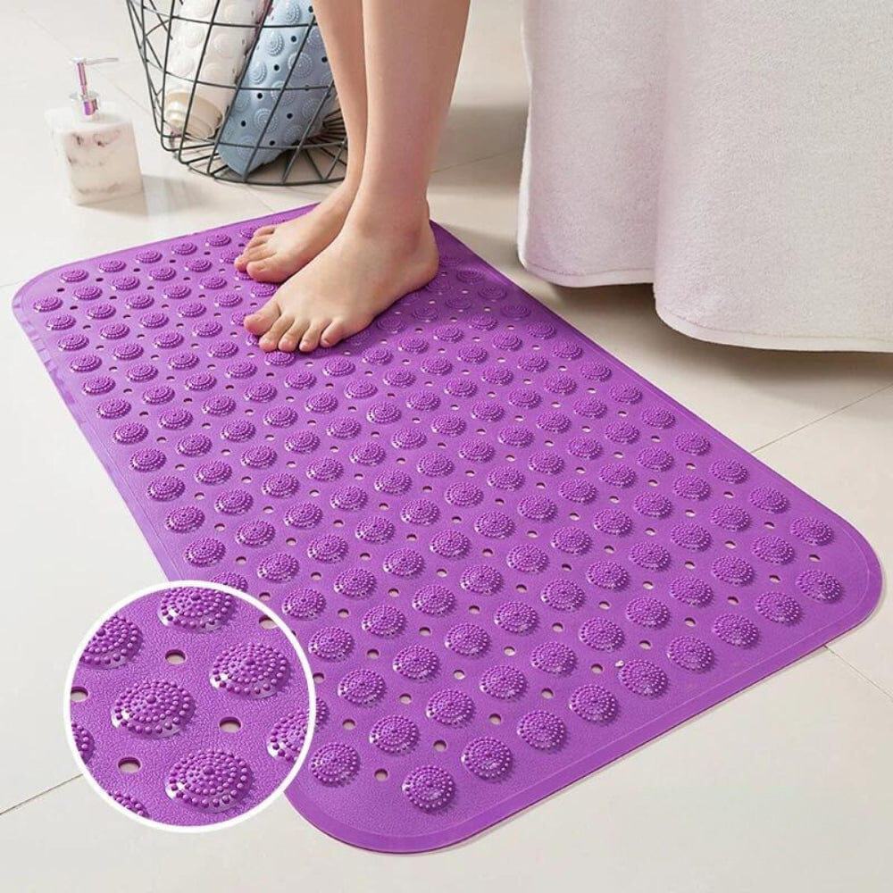 Purple textured bath mat with drainage holes for grip and comfort.