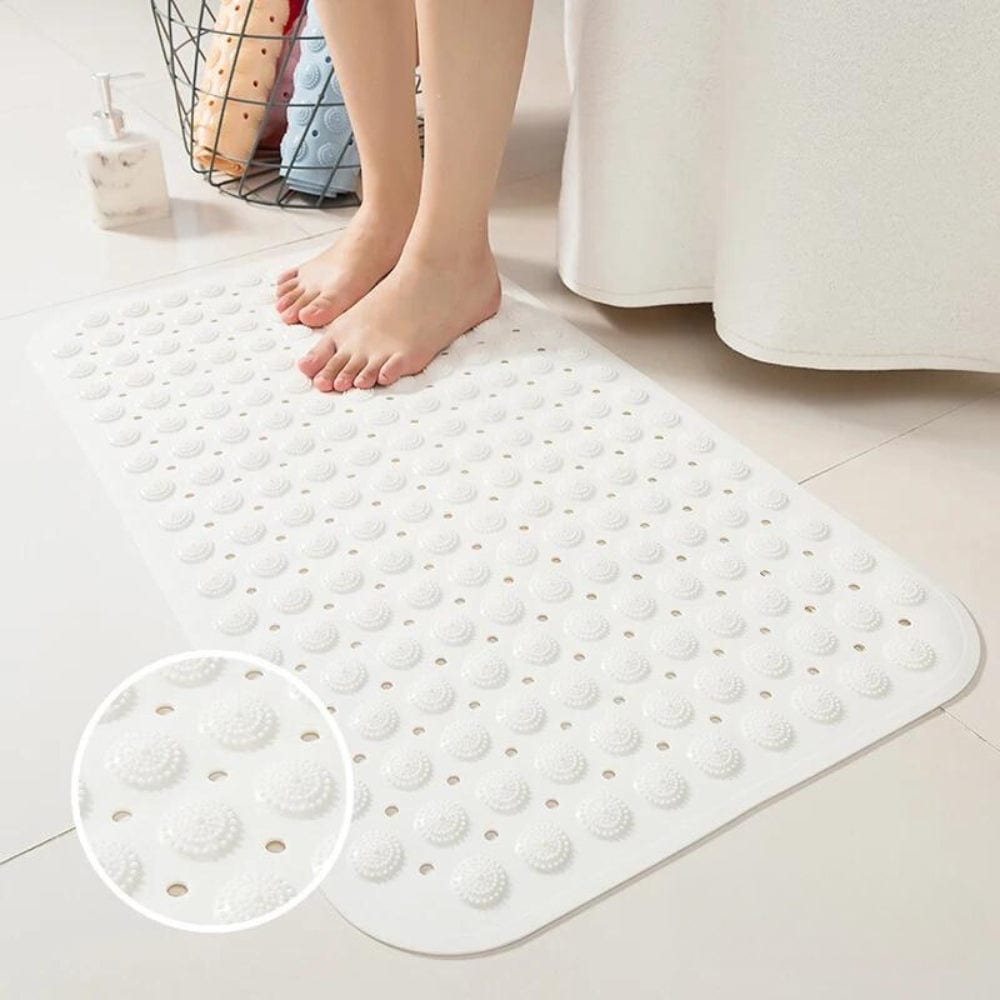 White non-slip bath mat with textured grip for bathroom safety.