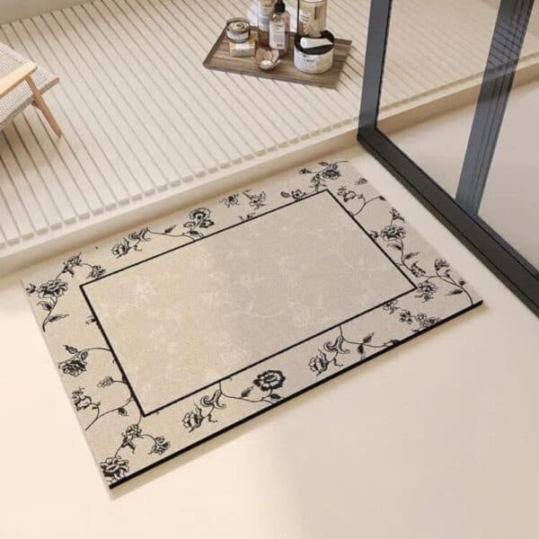 Beau Monde Bath Mat with floral border design for luxury bathroom.