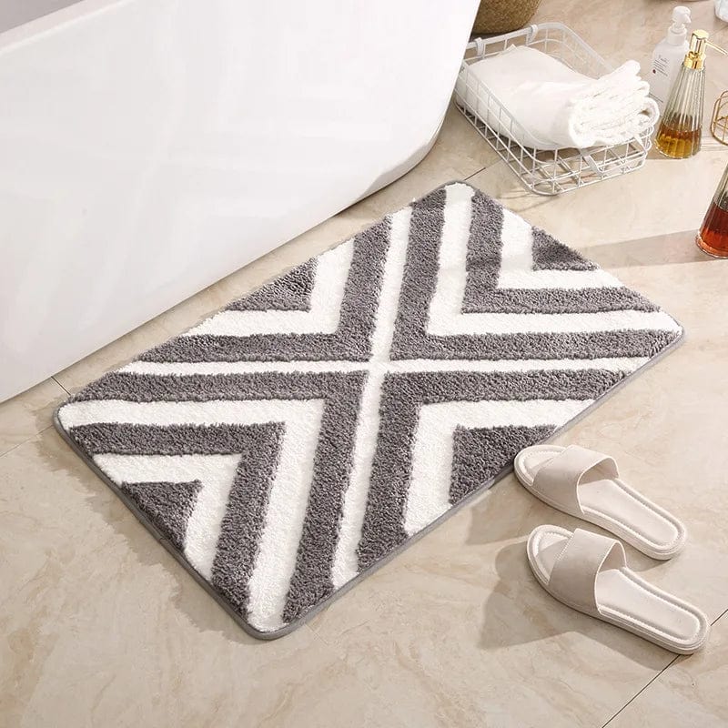 Blue Striped Bath Mat with Chevron Pattern for Bathroom.
