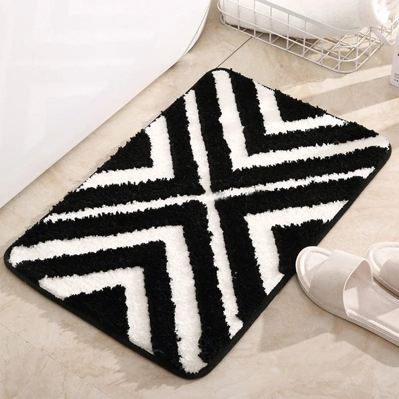Blue Striped Bath Mat with Chevron Pattern.