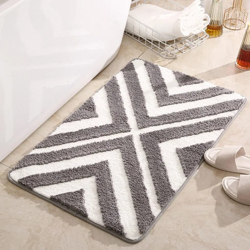 Blue Striped Bath Mat with Chevron Pattern for Bathroom.