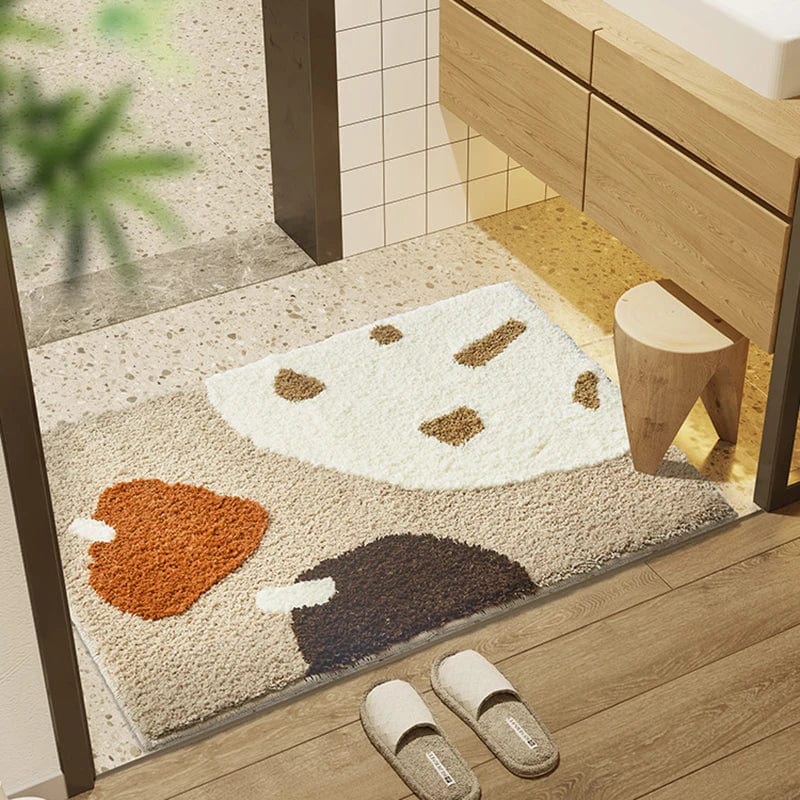 Brown and cream patterned bath mat in modern bathroom.
