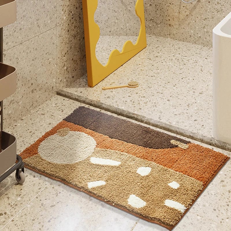 Brown and cream patterned bath mat for bathroom comfort and style.