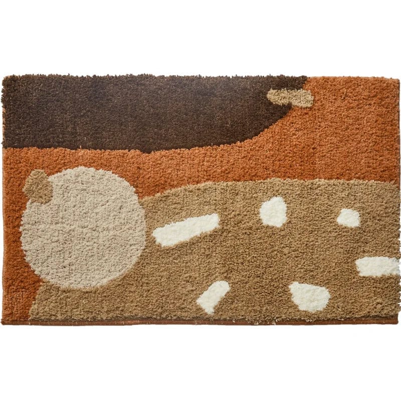 Brown and cream abstract bath mat with textured design.