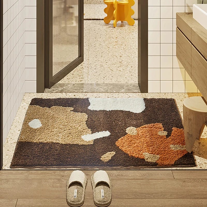 Brown and cream patterned bath mat in modern bathroom.