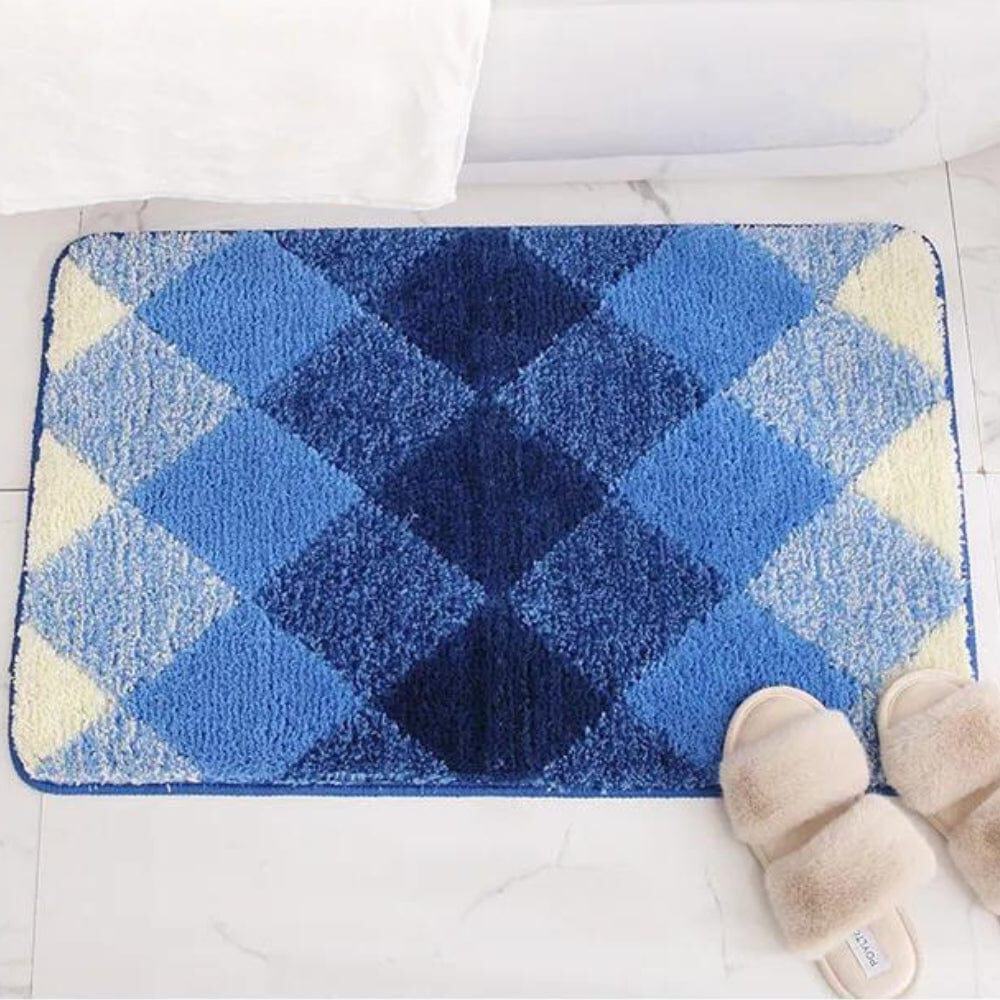Blue and cream checked bath mat with fluffy texture, perfect for bathroom comfort.