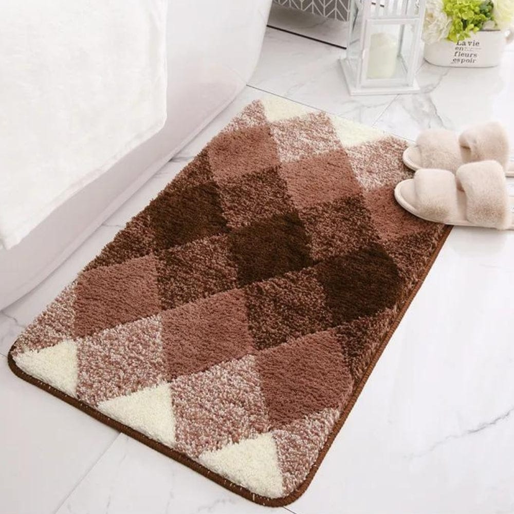 Brown and cream checked plush bath mat for bathroom comfort.