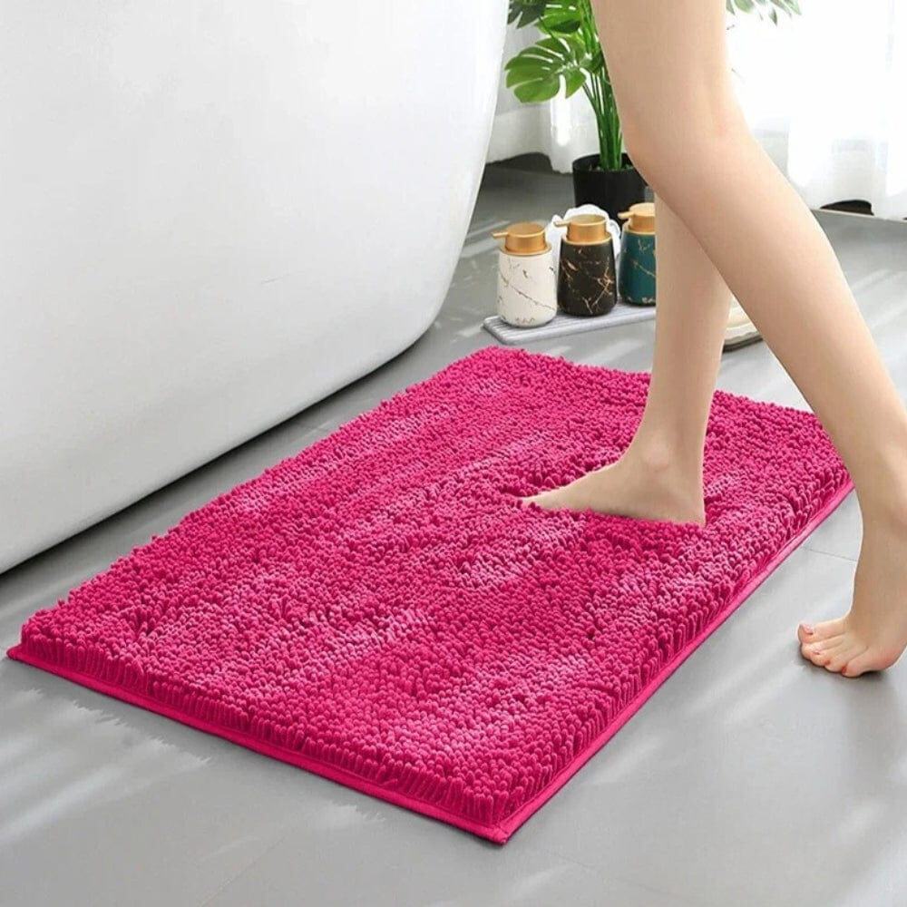 Pink Chenille Bath Mat for Soft Comfort.