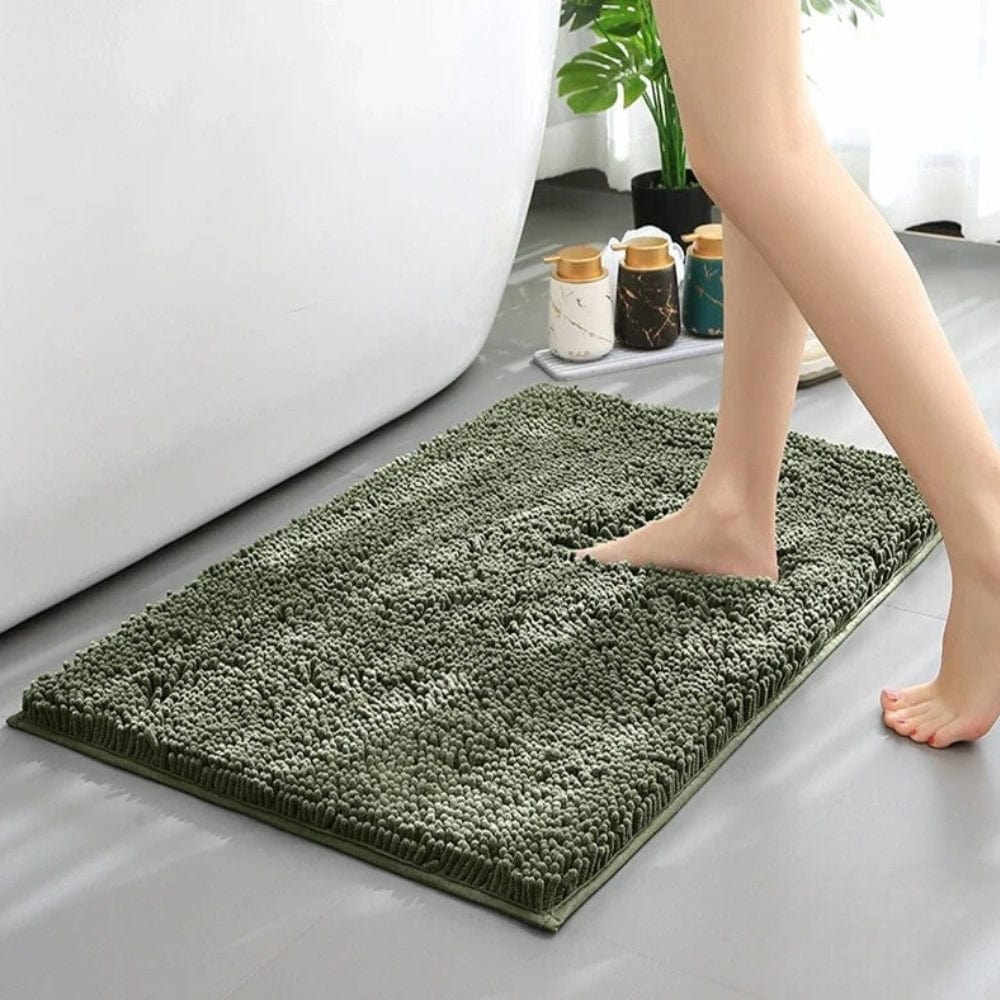 Green Chenille Bath Mat for Soft Comfort and Non-Slip Bathroom Use.